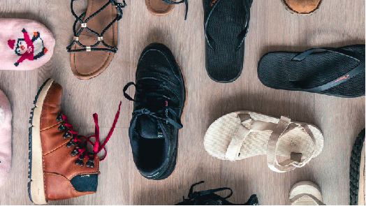 Image of different pairs of shoes supporting a blog post entitled 'one size communication does not fit all'