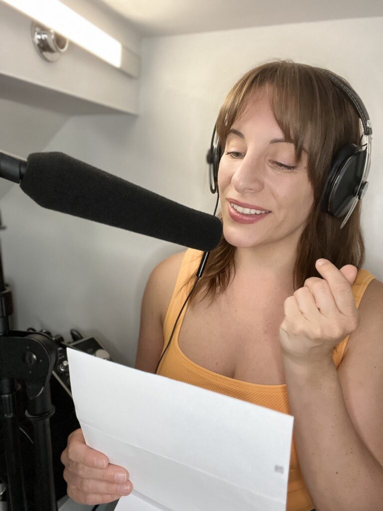 Photo of Esther Raday, Voice Artist recording a VoiceOver for an animation for Inky Thinking. Photos form part of a series of blogs on behind the scenes of an animation - Recording